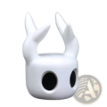 White smooth-surfaced Hollow Knight gaming controller stand figurine with upward-curving horns and large black eye openings