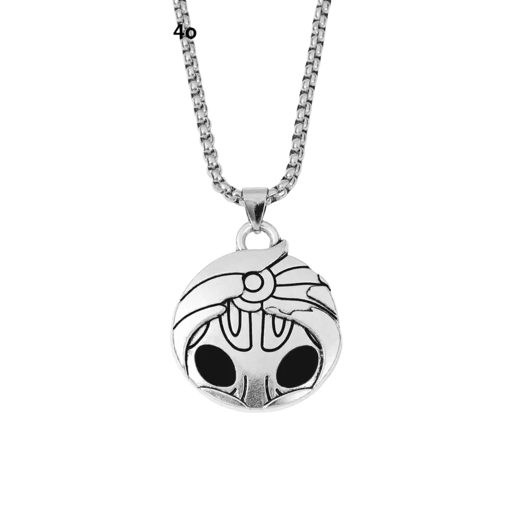 Silver hollow knight pendant necklace featuring a skull design with black inlay on a silver chain