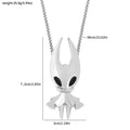 Silver hollow knight pendant necklace featuring a sleek stylized design with black eye accents for gaming fans