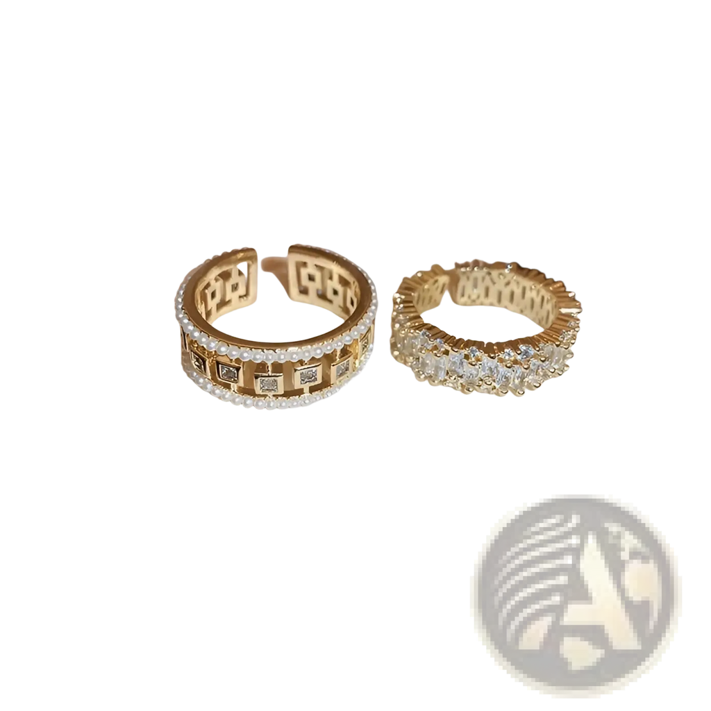 Two gold-toned open hoop rings with hollowed square pearl design and baguette zircon stones in a formal style