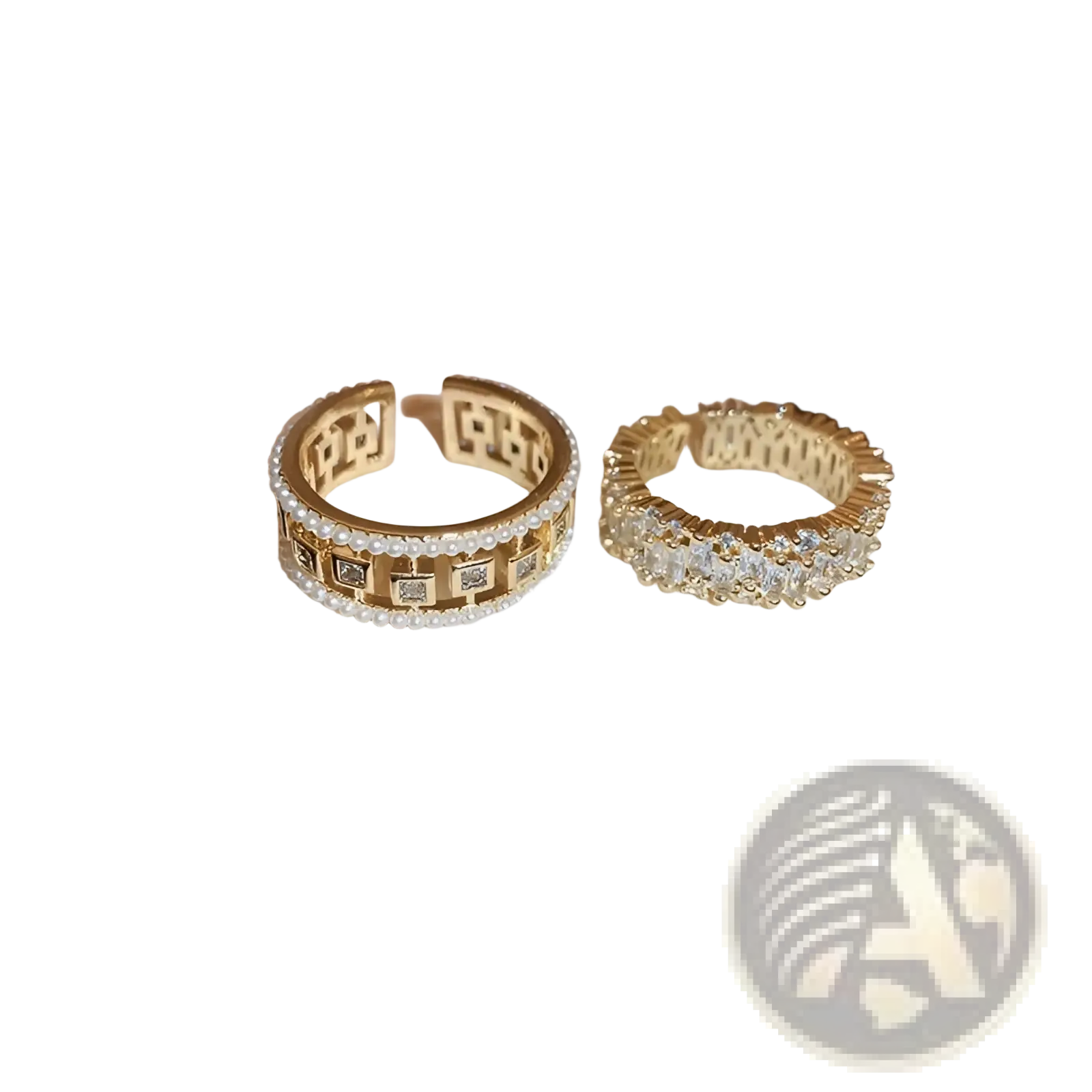 Two gold-toned open hoop rings with hollowed square pearl design and baguette zircon stones in a formal style