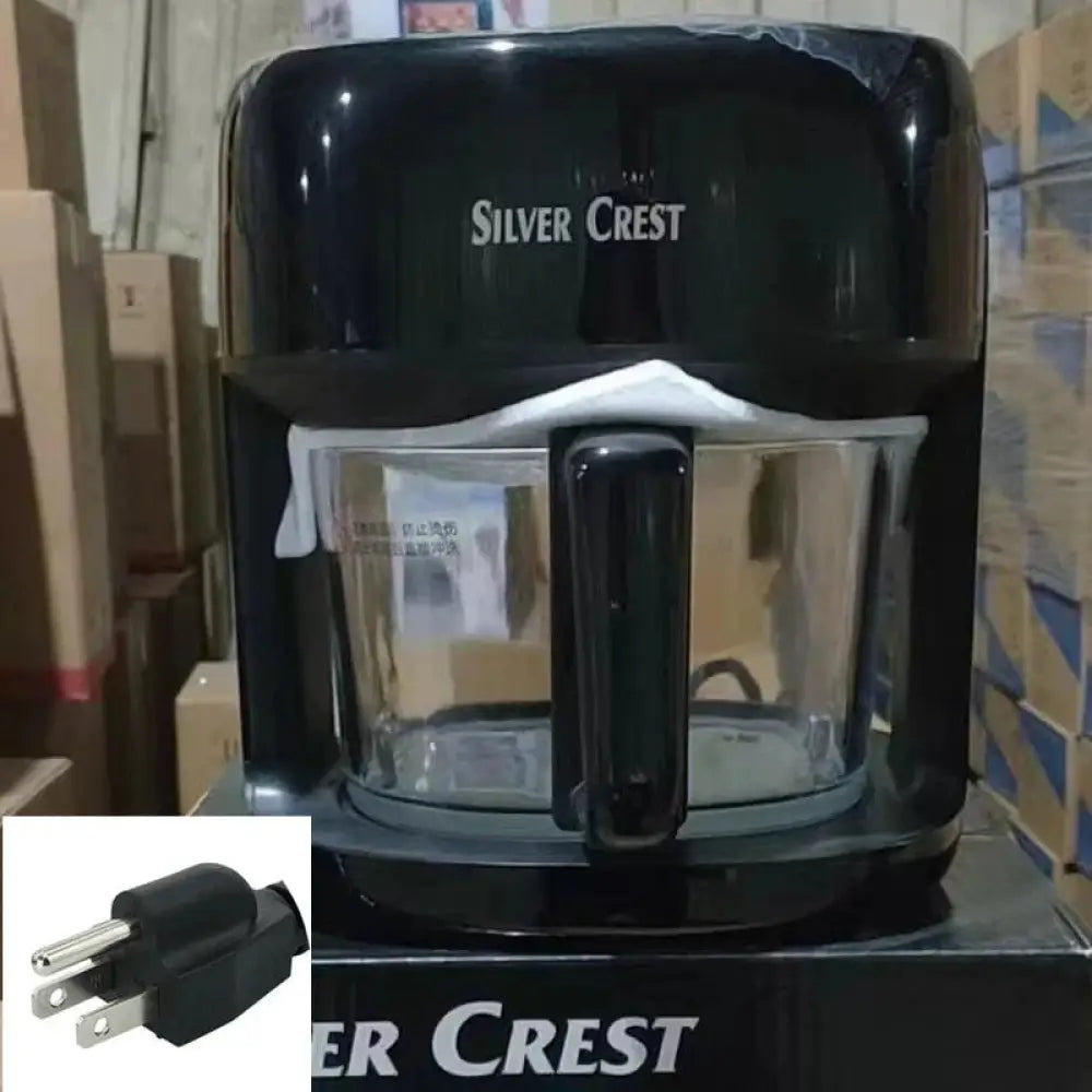 Black silver crest drip coffee maker with clear glass carafe and black handle shown with large capacity air fryer