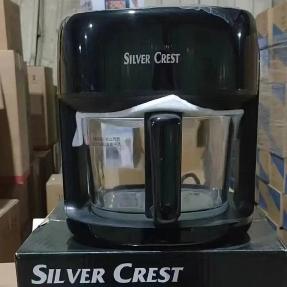 Black silver crest drip coffee maker with clear glass carafe and black handle shown alongside large capacity visual smart air fryer with viewing window