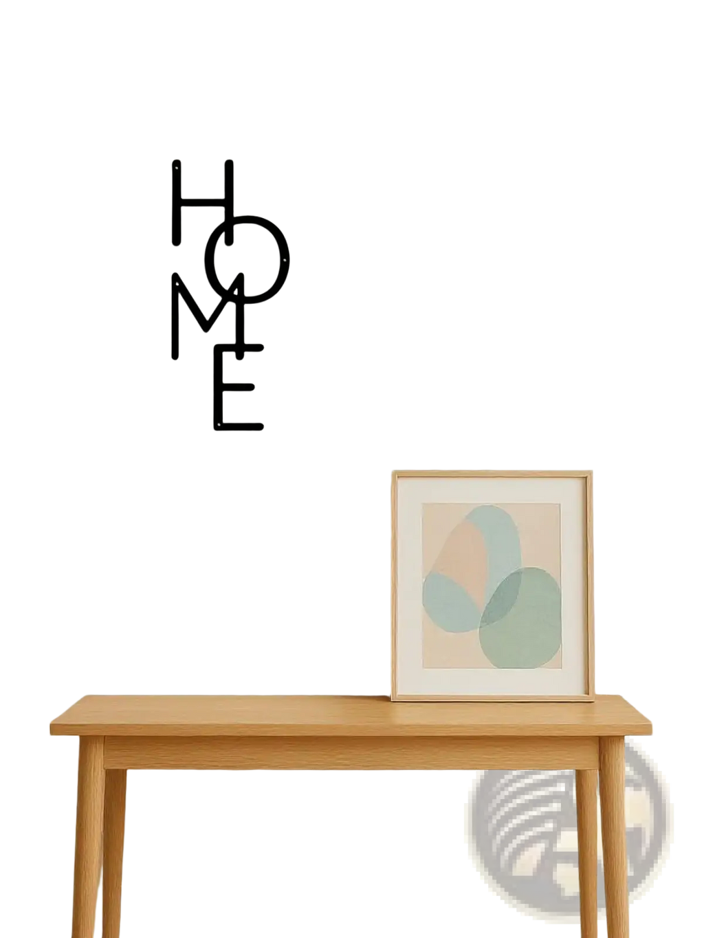 Black metal wall decor spelling home in a modern minimalist font perfect for contemporary interior decoration