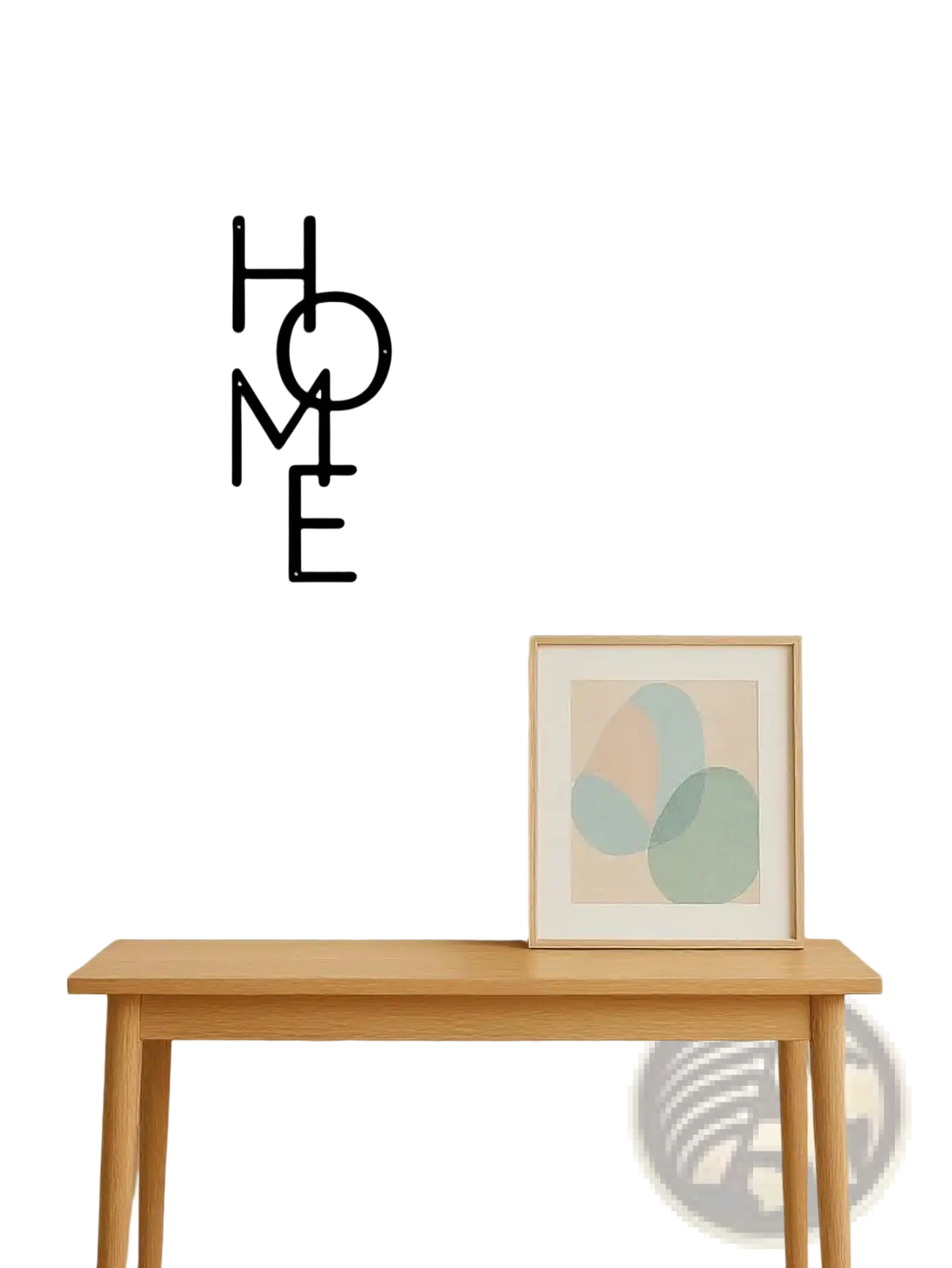 Black metal wall decor spelling home in a modern minimalist font perfect for contemporary interior decoration
