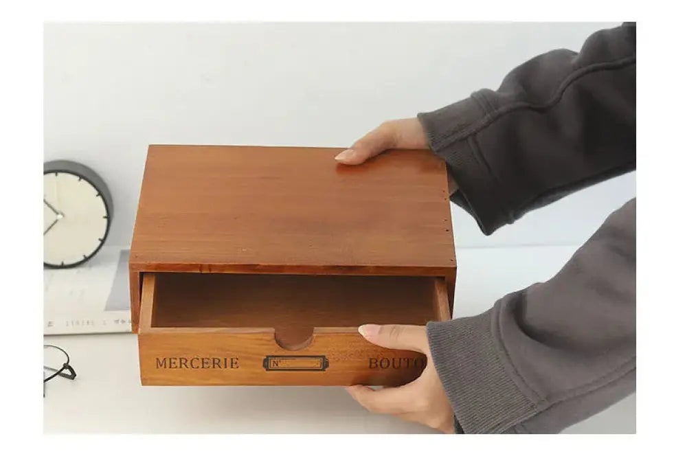 Retro lockable wooden storage box with vintage drawers featuring warm brown finish and engraved french text mercerie boutique