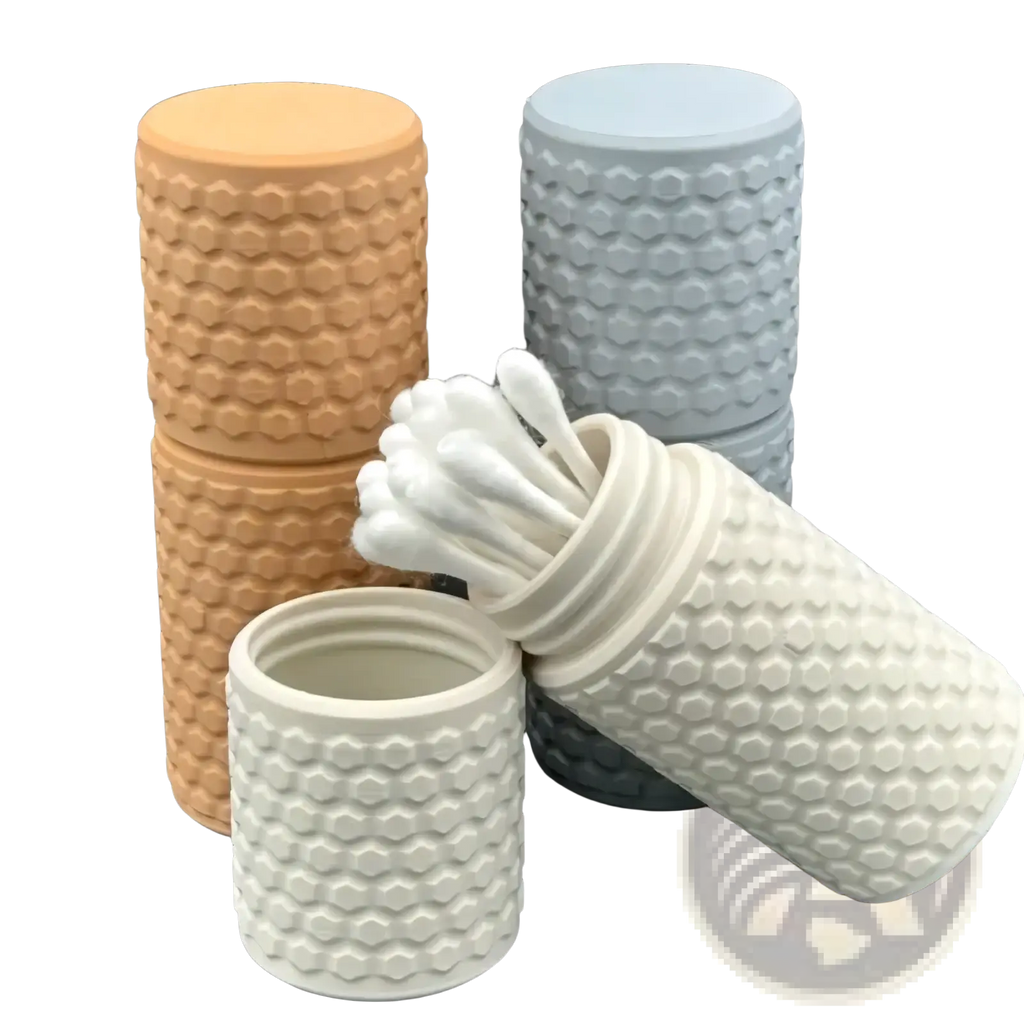 Beige honeycomb silicone cotton swab holder with hexagonal texture and matching lid for storage organization