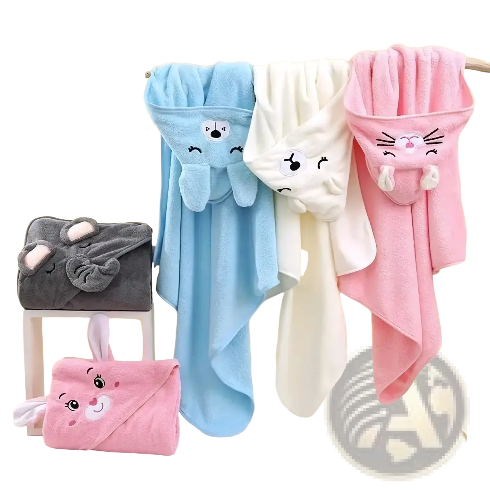 Soft cotton hooded baby bath towels in pastel blue white and pink with embroidered bunny faces and floppy ears for swaddling