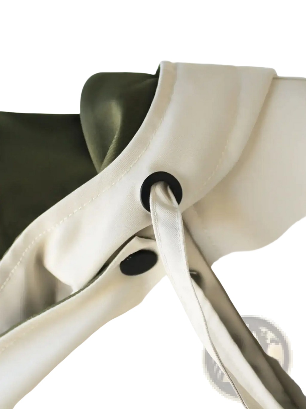 Cream-colored satin strap with black grommet detailing on hooded trench coat utility jacket accessory