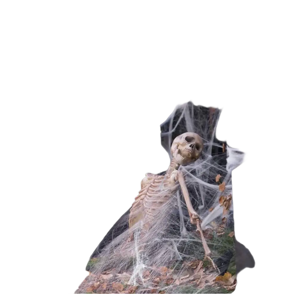 A beige plastic skeleton draped in white artificial spiderwebs between dark gray planters for horror props halloween use