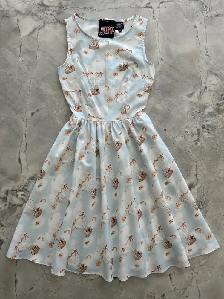Sleeveless light blue cotton vintage hot air balloon a-line dress with a fitted waist and full skirt