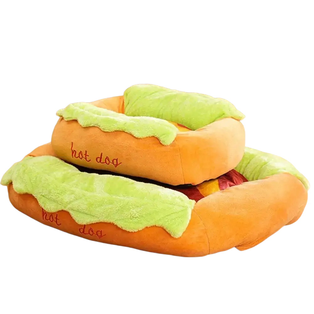 Orange plush hot dog pet bed with green lettuce and red sausage details as a cozy resting place for cats and dogs