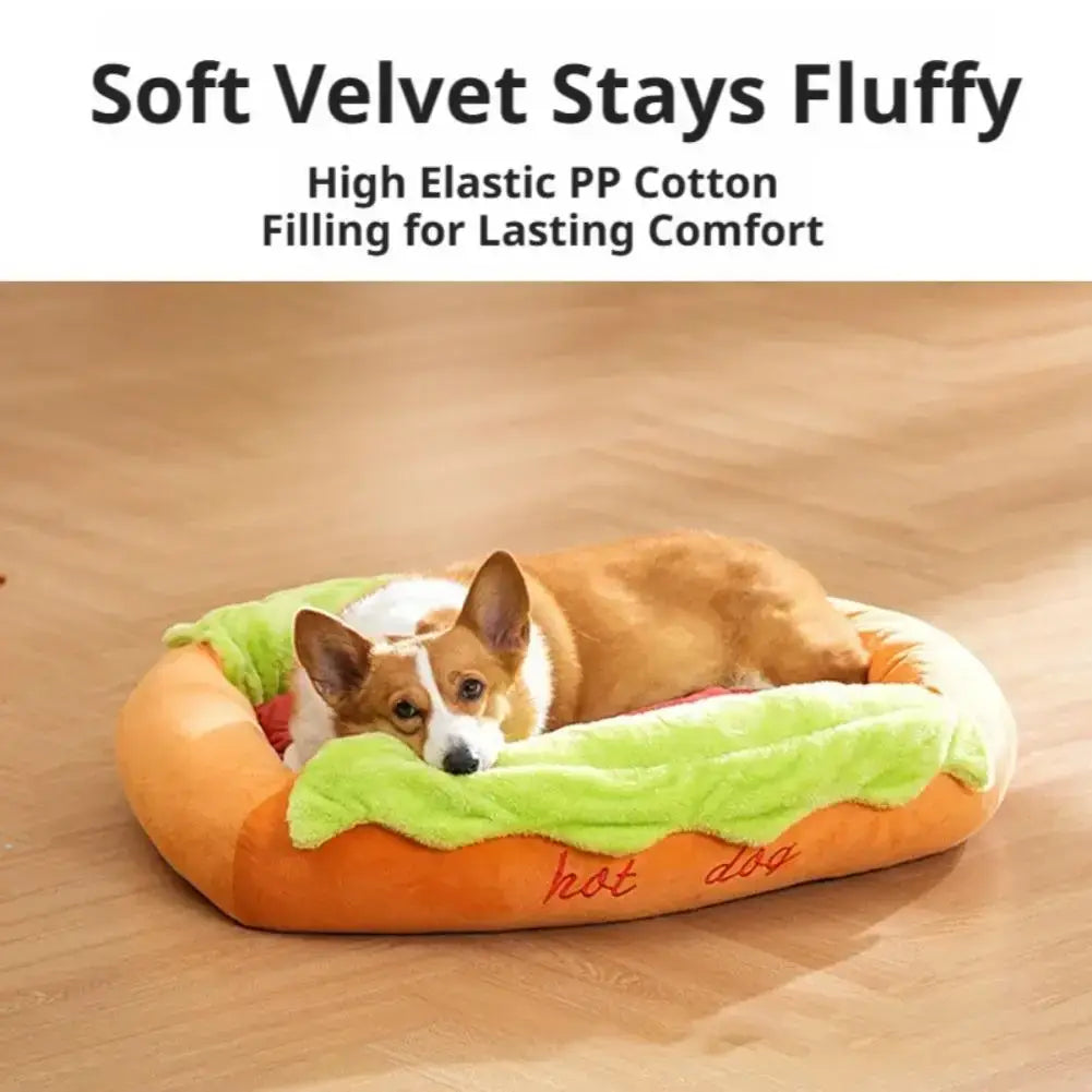 Orange and green plush hot dog pet bed with hot dog embroidered in red provides a cozy resting place for cats and dogs