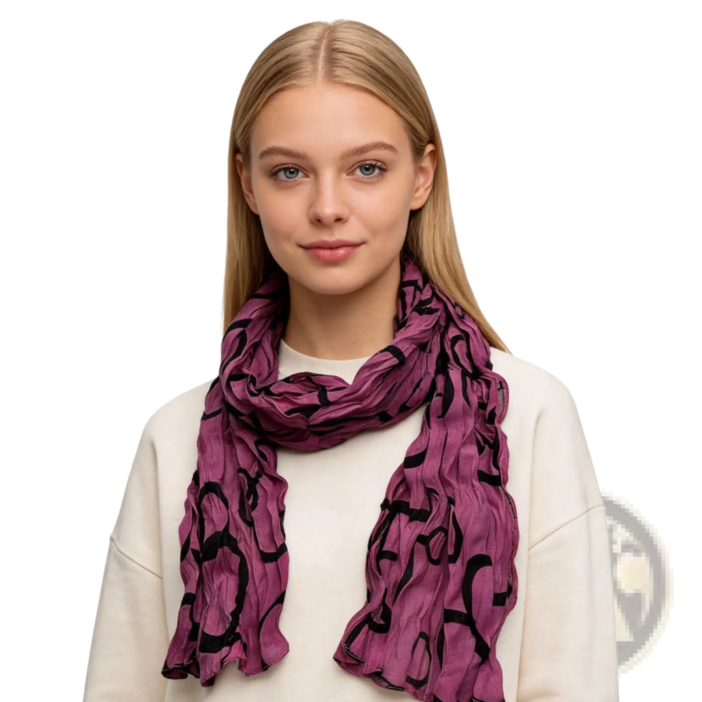 A soft flowing purple polyester scarf with a bold black abstract pattern draped elegantly around the neck