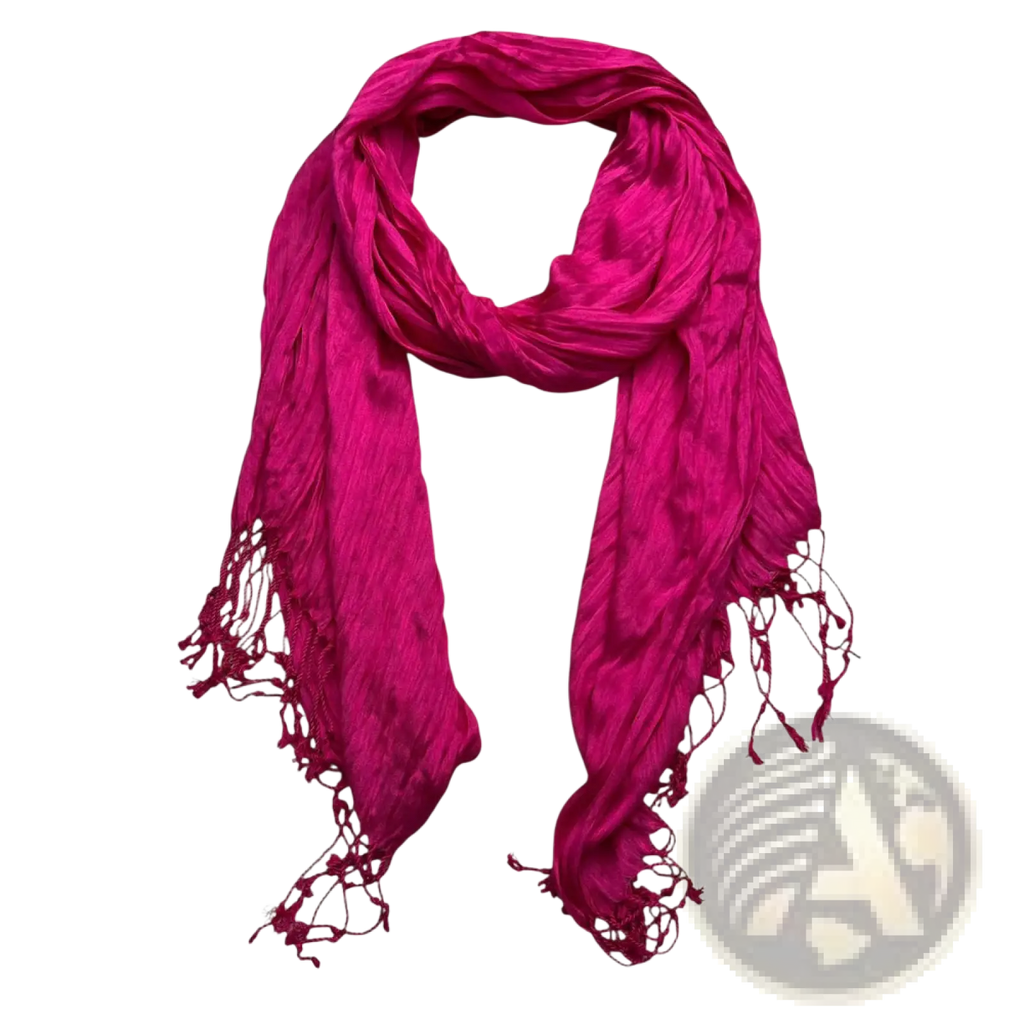 A vibrant hot pink crinkle silk scarf with subtle sheen delicate fringed edges and soft draping folds for women