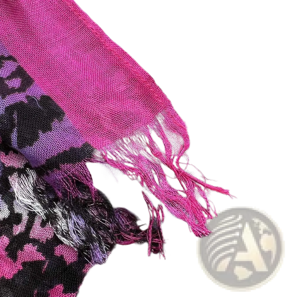 A vibrant hot pink and purple leopard print extra long viscose scarf with fringed edges