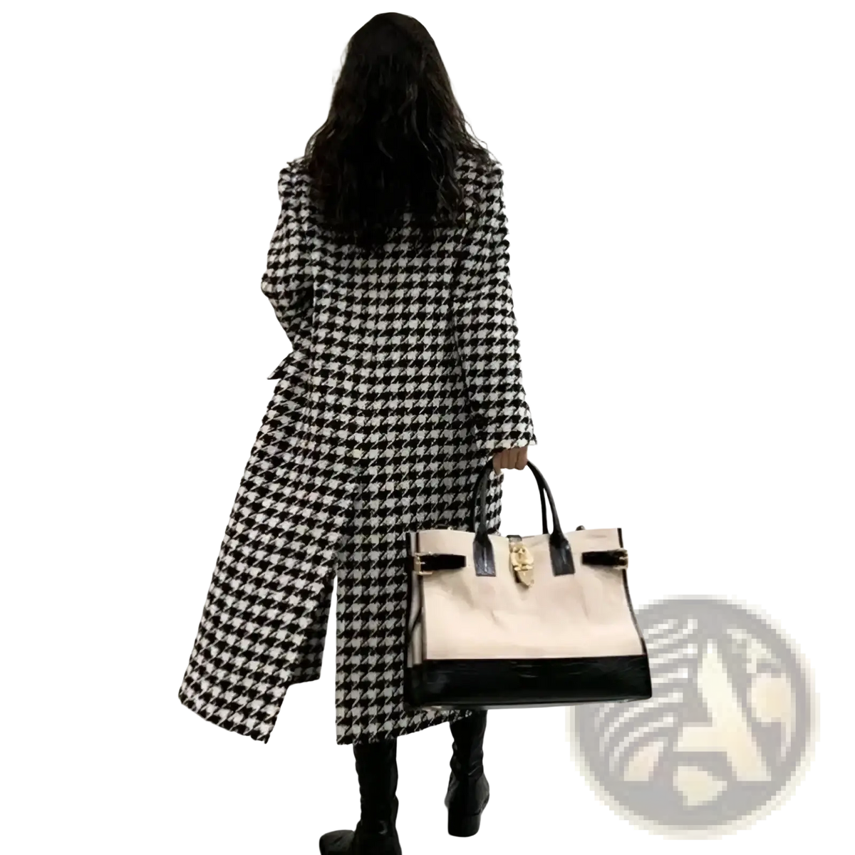 A cream and black two-tone handbag with glossy patent leather base and gold hardware, paired with a houndstooth double breasted wool coat