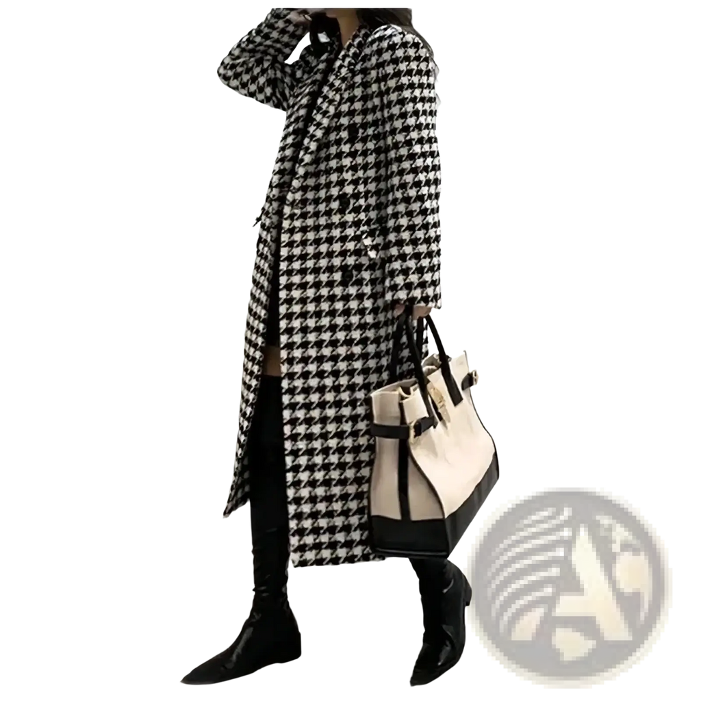 A long black and white houndstooth wool coat with a classic double breasted design for formal wear