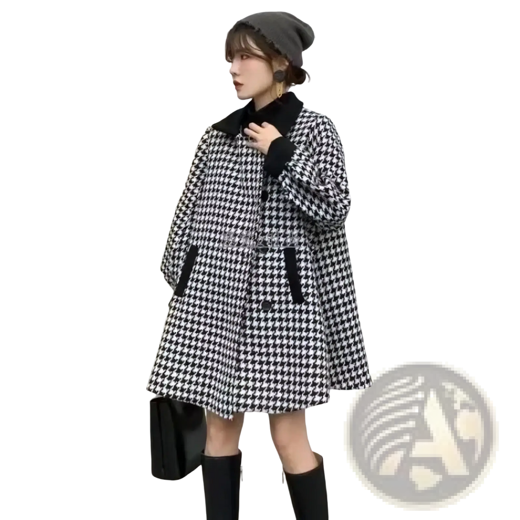 Houndstooth wool blend blazer coat with black collar, cuffs, and pocket trim in black and white pattern