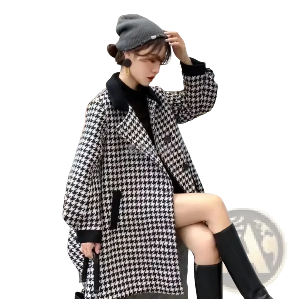 Black and white houndstooth wool blend blazer coat with black collar cuffs and pocket trim for stylish outerwear