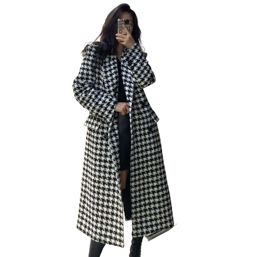 Houndstooth wool double breasted coat in black and white with a classic tailored long design