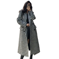 Houndstooth wool double breasted coat in black and white with a classic tailored long design