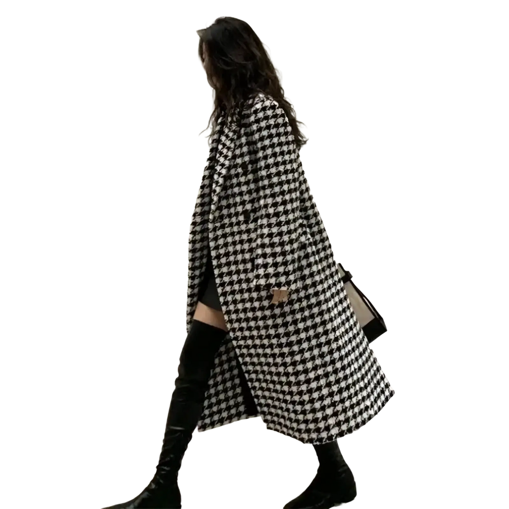 A long black and white houndstooth wool double breasted coat with a classic design for stylish outerwear