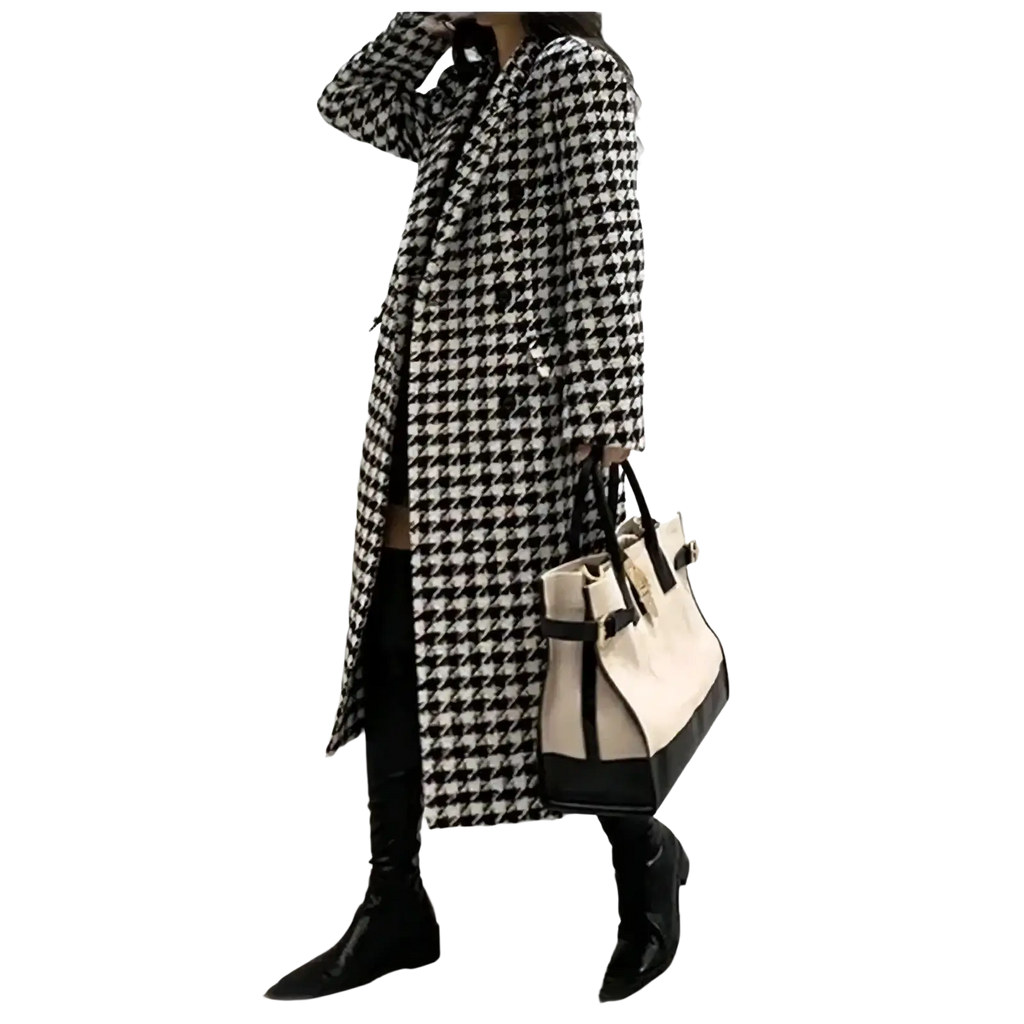 A long black and white houndstooth wool coat with a classic double breasted design