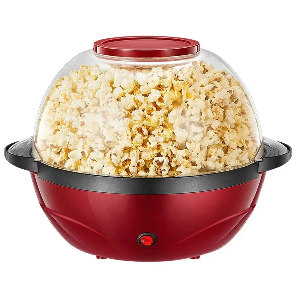 850w electric dome popcorn maker with red dome, clear glass top, black handles, filled with freshly popped kernels