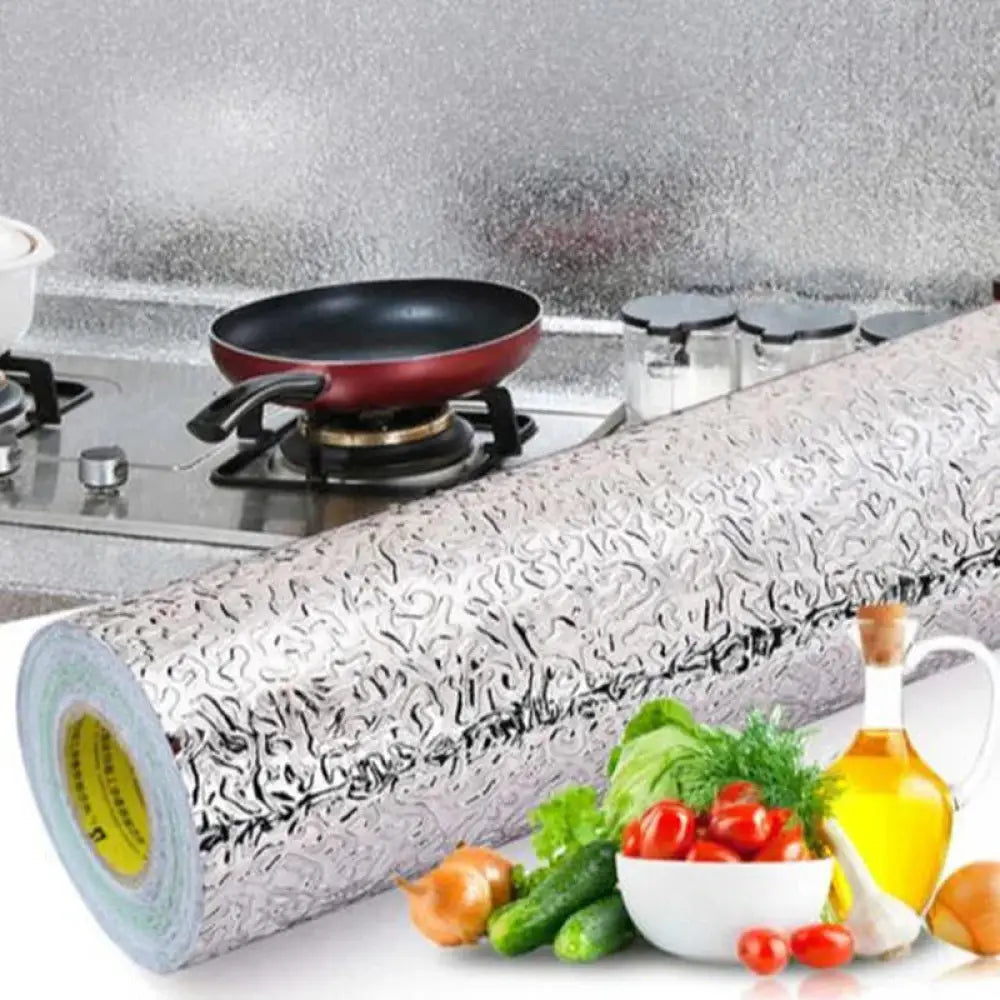 A roll of silver ornate patterned adhesive kitchen backsplash film with textured surface for household use