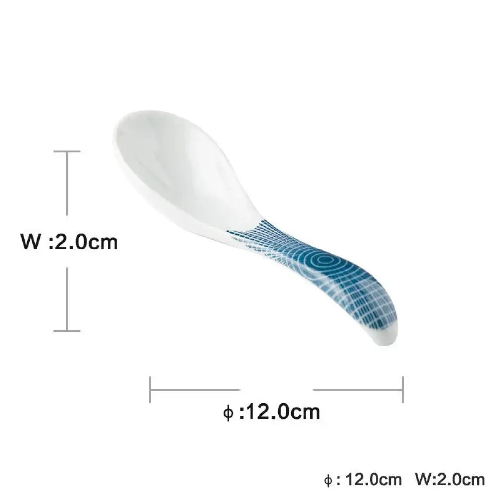 White ceramic spoon with blue geometric patterned handle from minimalist Japanese ceramic tableware dining set