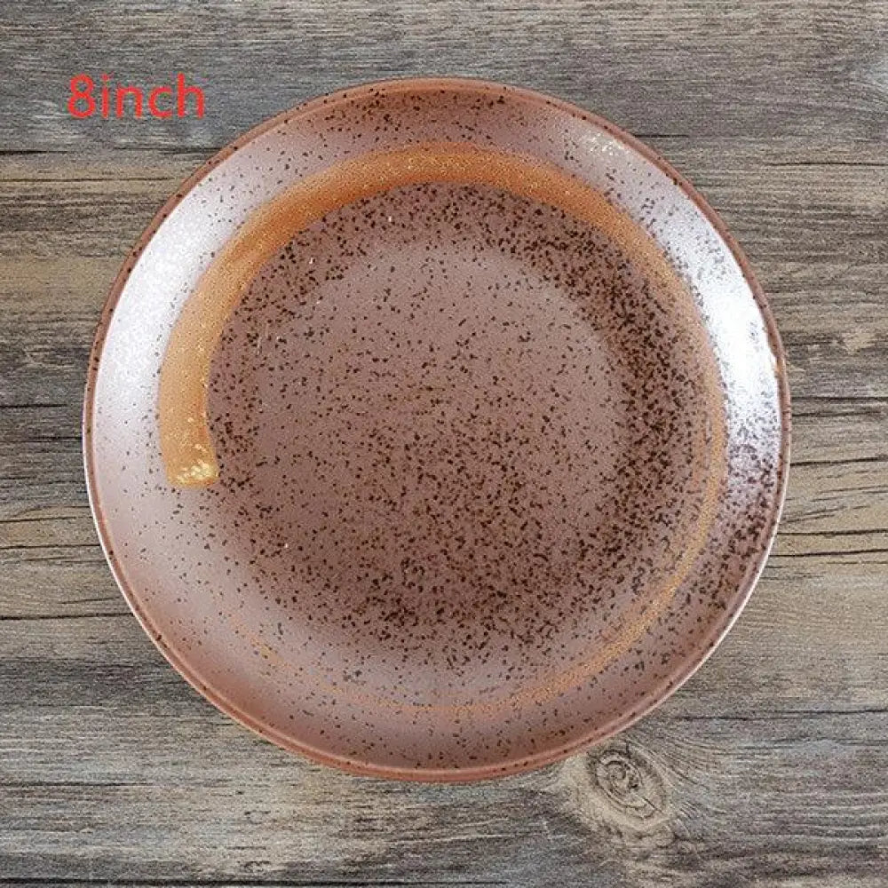 A rustic 8-inch ceramic plate with speckled brown glaze and glossy rim from minimalist Japanese ceramic tableware set