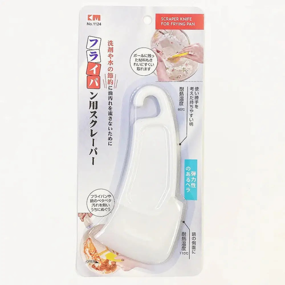 White plastic scraper knife with curved handle and serrated edge for frying pan from Smiley silicone kitchen squeegee