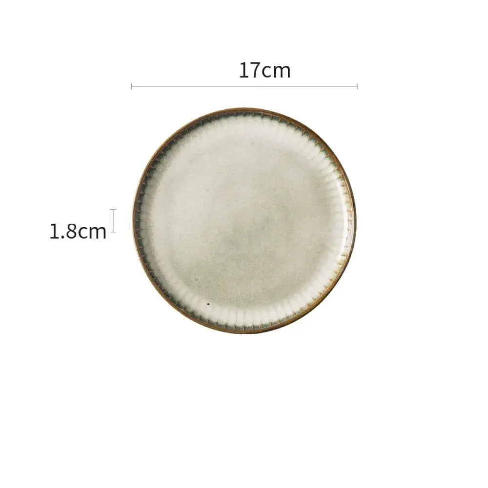 Nordic ceramic dinnerware plate 17cm diameter with matte off-white glaze and textured brown rim for minimalist dining
