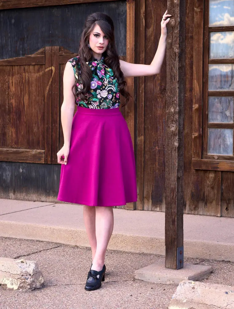 Vibrant magenta a-line skirt with high waist and full flared silhouette paired with hummingbird print vintage bow cotton blouse
