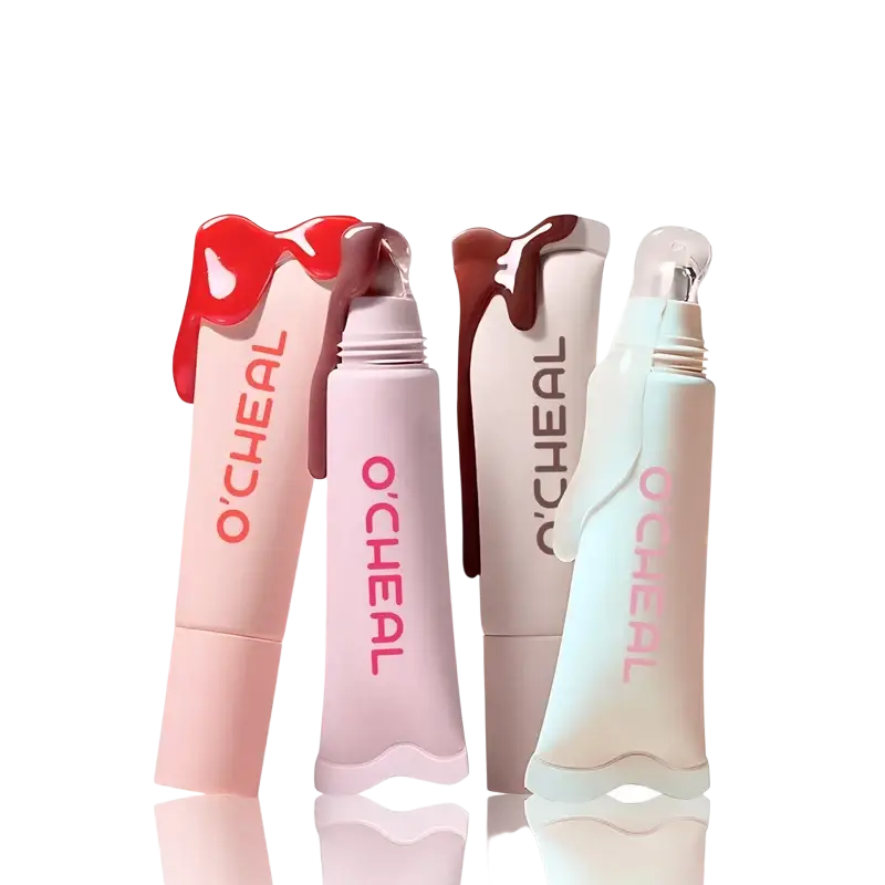 Four ocheal crystal glaze moisturizing lip care tubes in pastel shades with glossy dripping hydrating fruit flavored balm