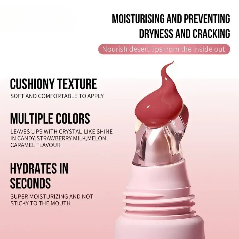 Hydrating fruit flavored glossy lip balm with pink cushiony texture and clear crystal applicator tip in multiple flavors