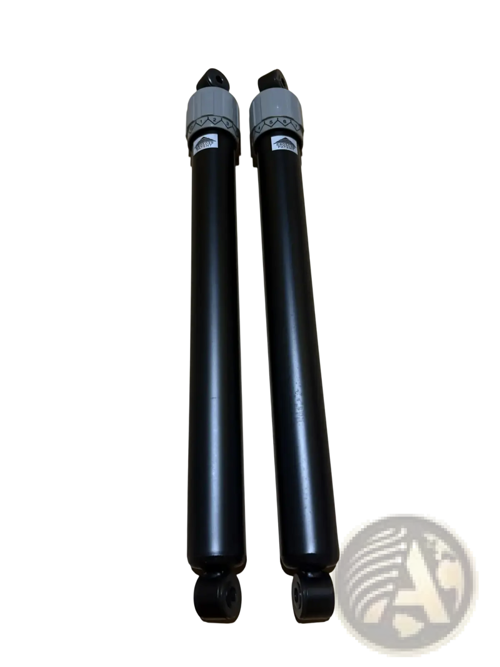 Black hydraulic cylinder rowing machine resistance regulator with gray caps and decorative bands in sleek design