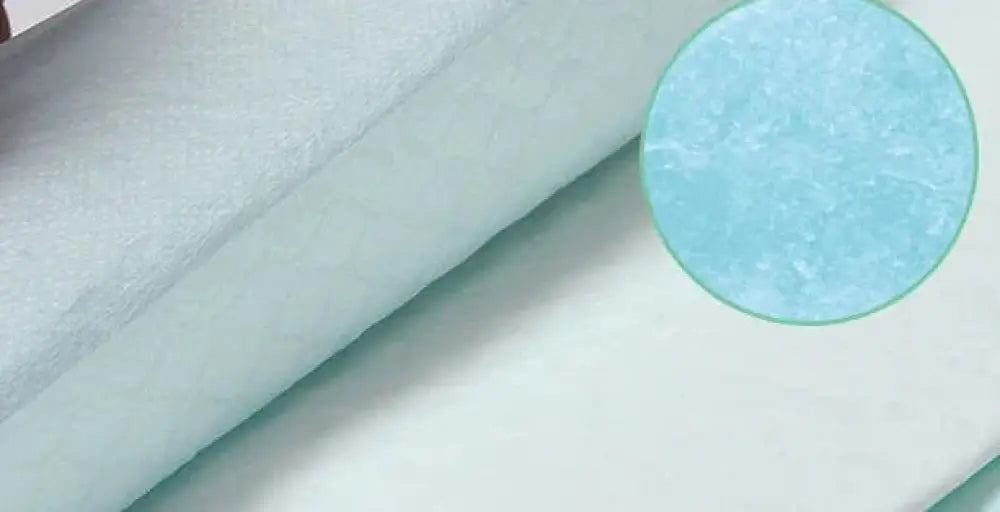 Ultra soft leak proof disposable nursing pads in pale blue fabric with a subtle textured surface
