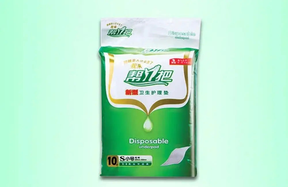 Ultra soft leak proof disposable nursing pads in green and white packaging with droplet design labeled helping hand in chinese