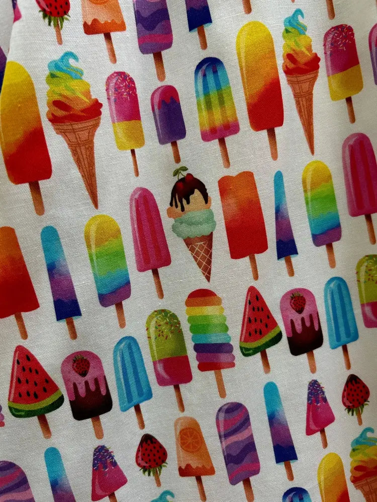 Rainbow ice cream print cotton skater skirt with vibrant colorful fabric featuring rainbow popsicles and ice cream cones