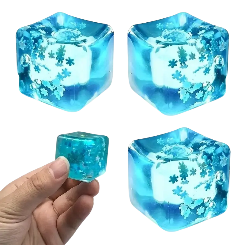Blue translucent cube-shaped ice cubes with embedded snowflake designs slow rising sensory fidget toy