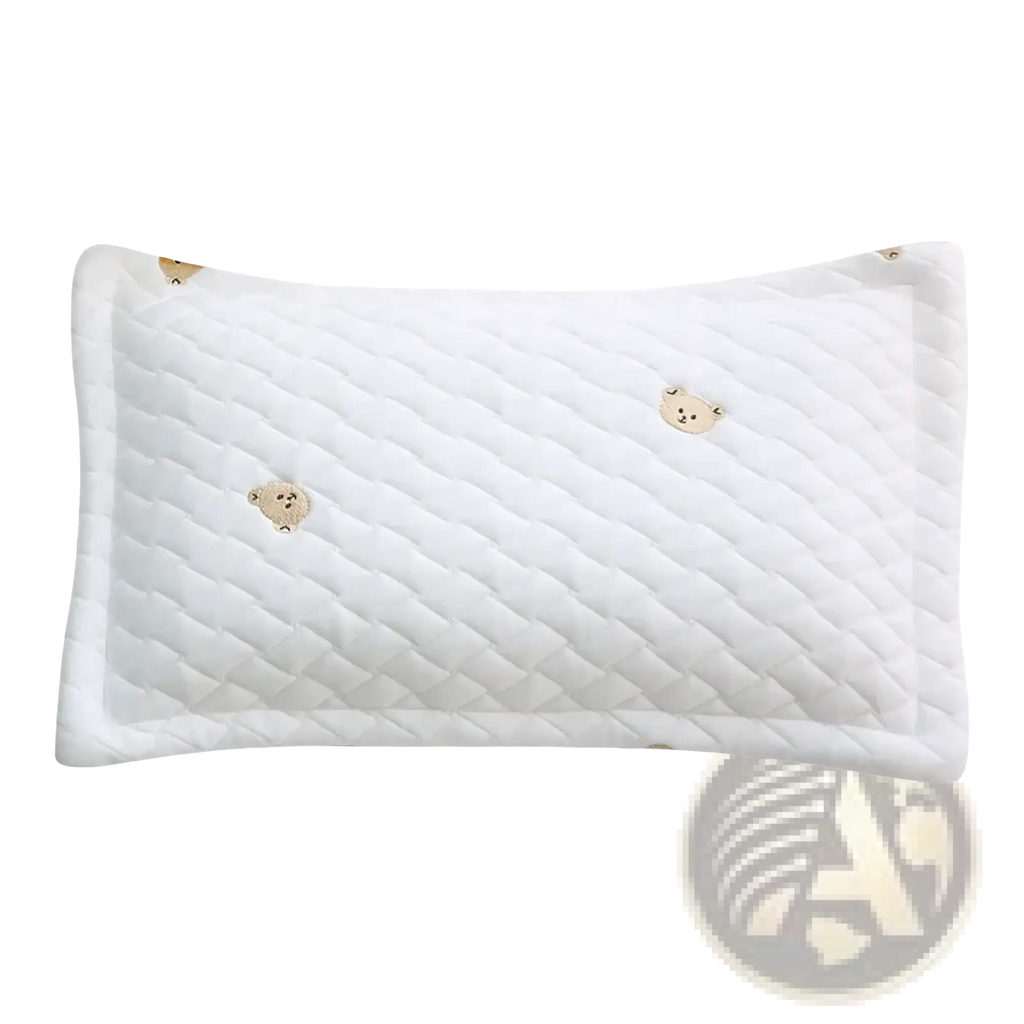 White quilted ice silk baby cooling pillowcase featuring embroidered soft beige teddy bear faces for newborns