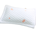 White quilted ice silk baby cooling pillow with pink embroidered cartoon characters for newborns