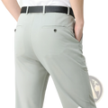 Light gray ice silk men slim-fit thin dress pants with subtle texture paired with a black leather belt