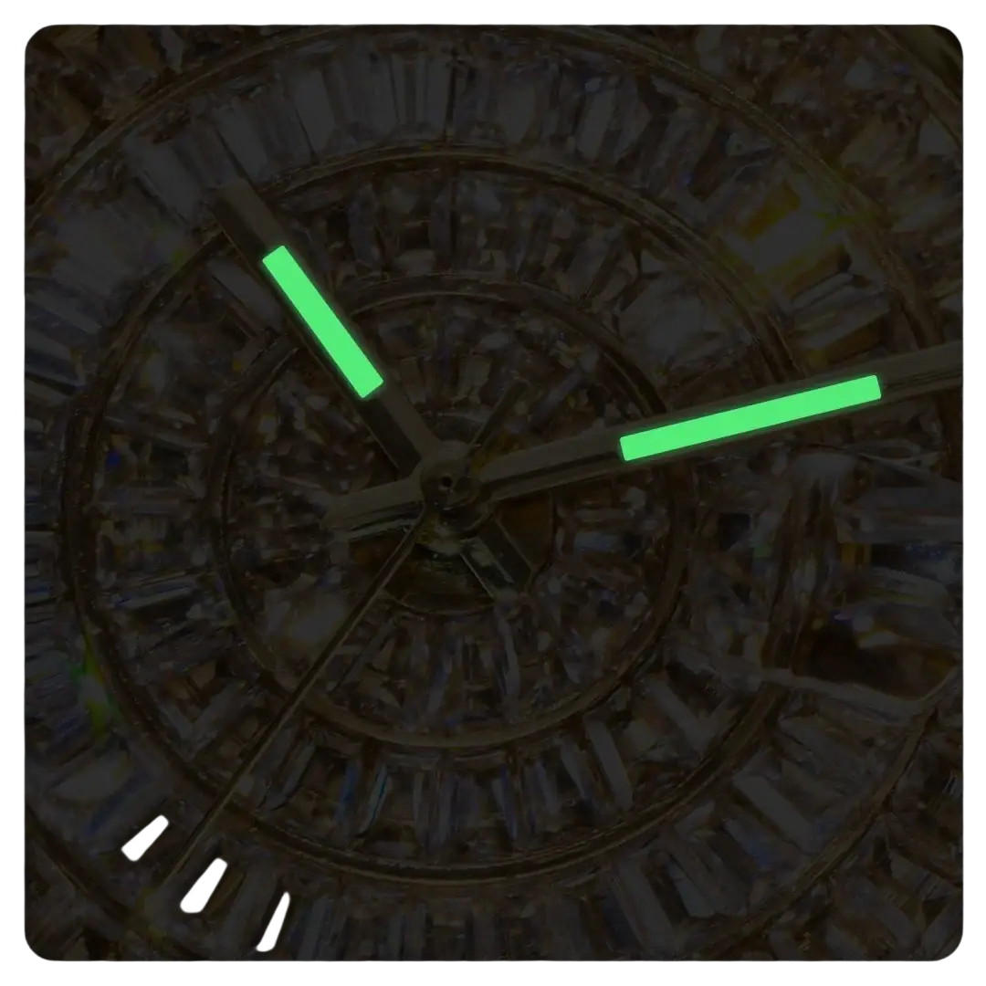 A close-up of an iced out men luxury diamond watch silver steel with glowing green hour and minute hands on a dark dial
