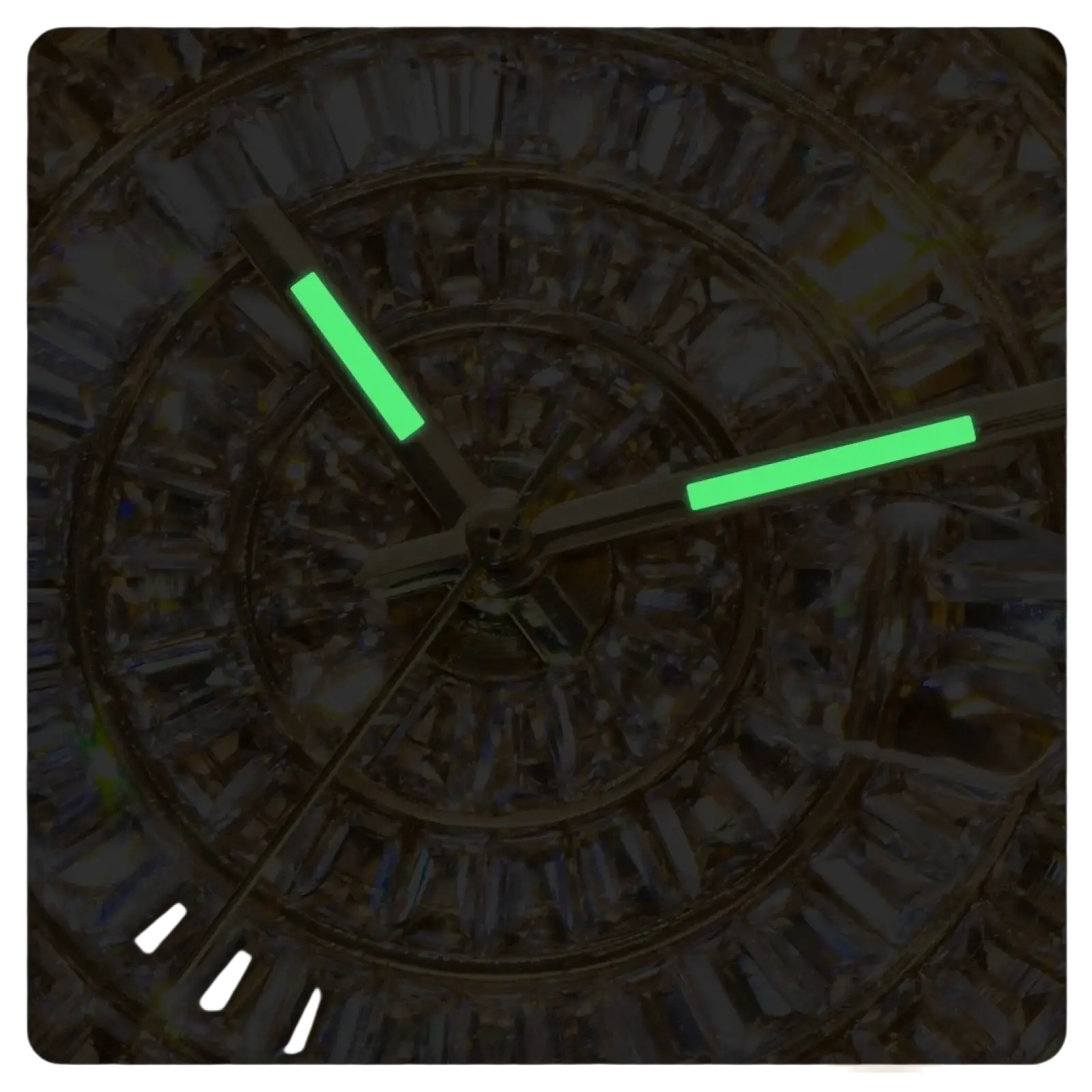 A close-up of an iced out men luxury diamond watch silver steel with glowing green hour and minute hands on a dark dial
