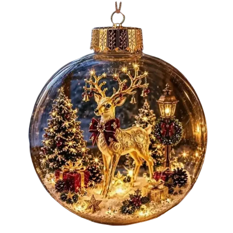 Illuminated glass Christmas ornament ball featuring a gold deer figurine with intricate antlers and red bow inside a globe