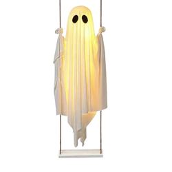 A glowing white swinging ghost decor with flowing translucent fabric and black eyes for outdoor Halloween use