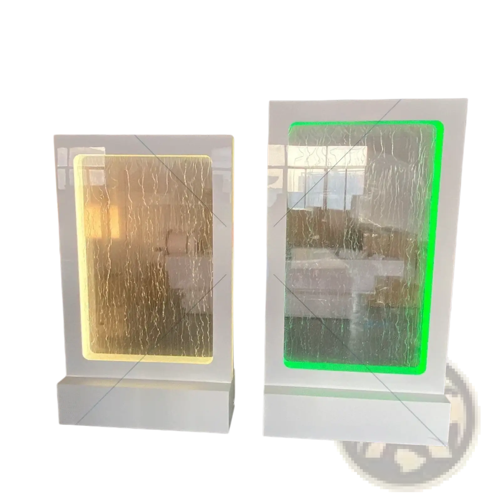 Two illuminated wedding water fountain backdrop sign panels with warm yellow and vibrant green glass waterfall effects in white frames